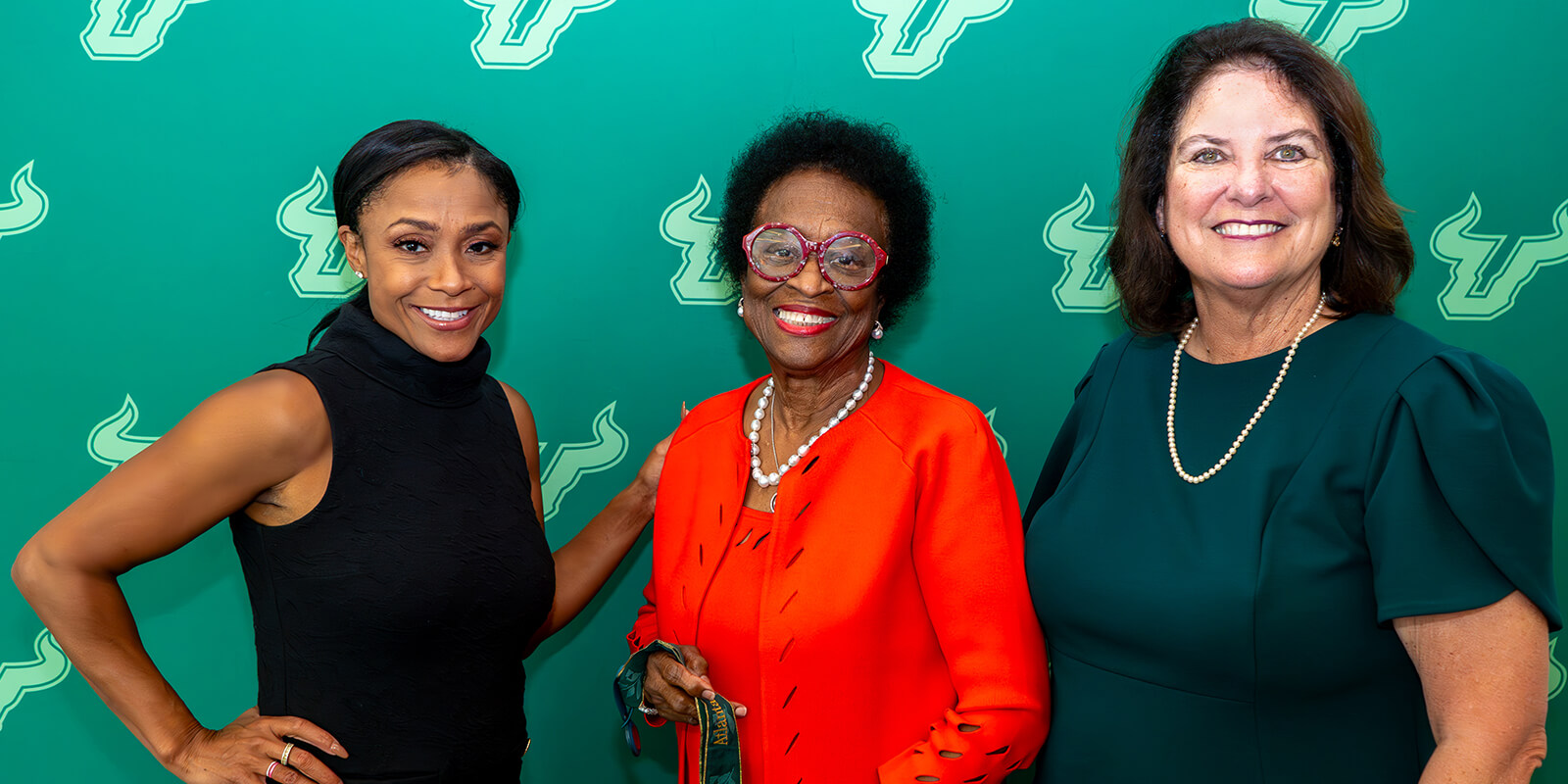 Dominique Dawes, Sen. Arthenia Joyner, and Rita Lowman